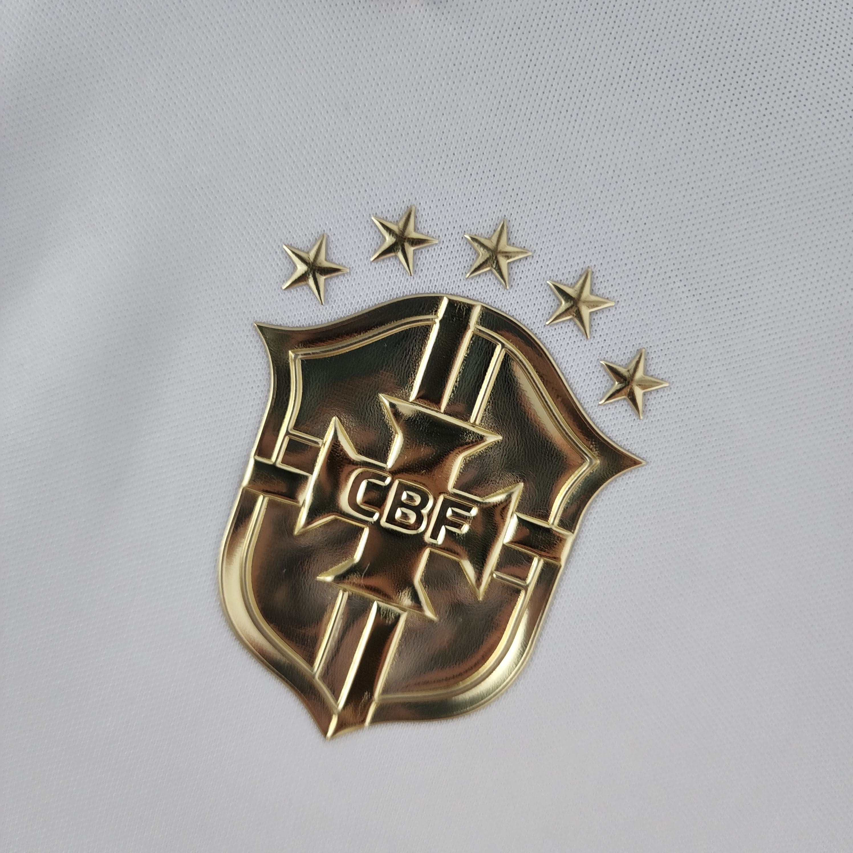 Camisa Feminina Seleção Brasil 2022/23 Branca e Dourada
